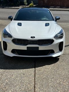 White sedan front view